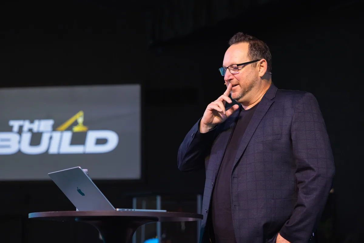 Mike speaking on stage